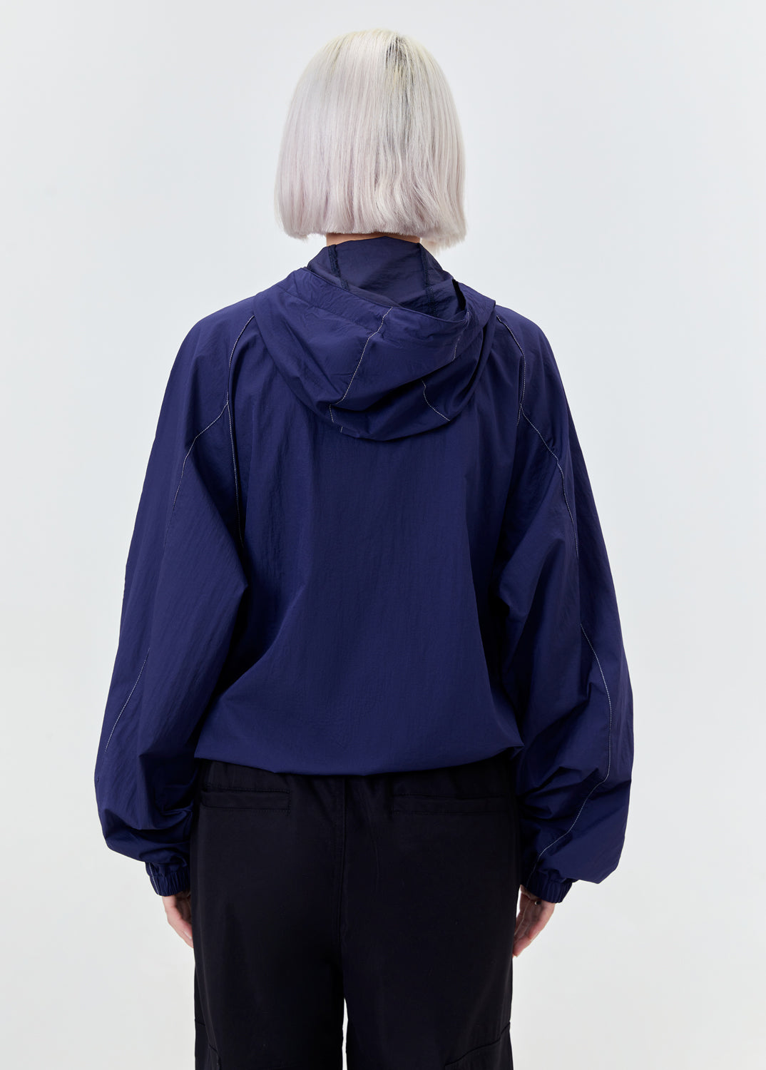 GLOWING UNDER THE SUN WINDBREAKER